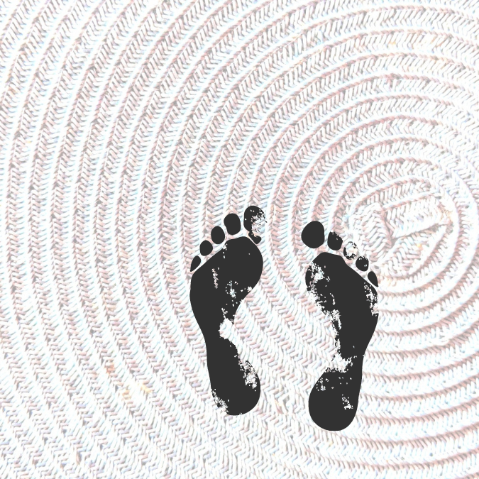 footprints on spiraled carpet